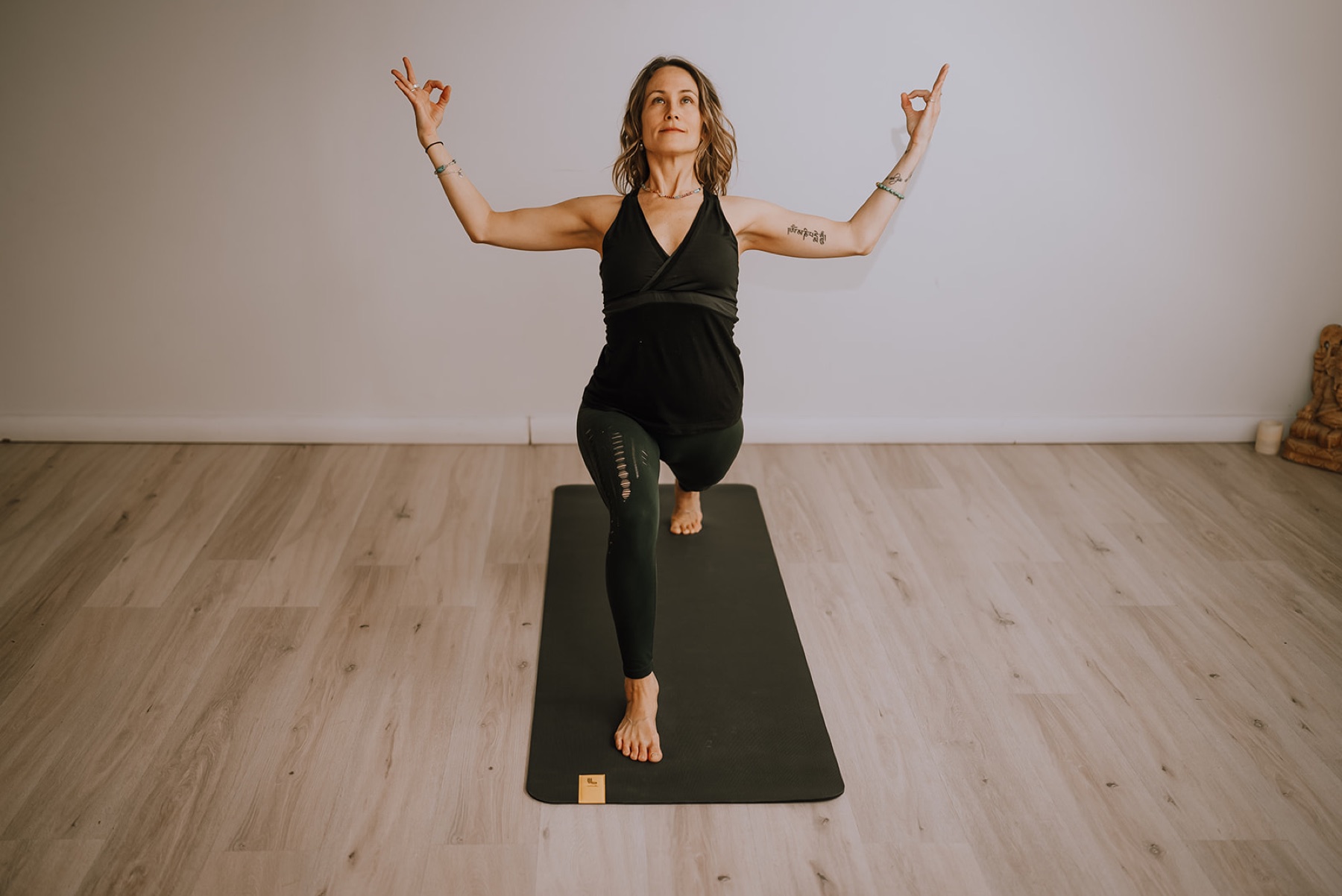Aly Paws practicing yoga in her studio